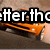 Pixelated image showing partial white text on black background with orange flame-like shapes below.