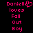 Pixelated pink text on black background displays "Danielle loves Fall Out Boy" with a heart symbol replacing the 'a' in Danielle.