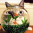 Pixelated cat with large face inside fishbowl, purple background with yellow text reading WHOA! that cat has a HUGE FACE!