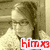 Pixelated image of a person with light-colored hair and glasses, wearing a white top against a muted background with red text overlay.
