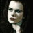 Static 48x48 pixel icon showing a stylized close-up of a person's face with dark hair against a black background, featuring visible dithering and color blending in the rendering.