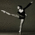 Pixelated static image of a ballet dancer in arabesque pose with one leg extended backward and arms outstretched against dark background.