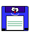 Pixelated floppy disk icon with blue casing, purple top section, and white document area with green lines, featuring a cartoon face with white eyes, red nose, and blue mouth, alongside pink and purple text reading "Save it to your computer" on gray background.