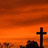 A split-screen image with a sunset landscape on the left and blue background with text on the right.