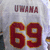 A static image shows a sports jersey with the name 'UTAH' in maroon letters above large red numerals '69' outlined in gold on a light gray background.