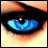 A close-up of a blue eye with black eyeliner and light skin, showing subtle animation changes