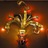 A pixelated static image of a chandelier with multiple glowing lights against a dark background.
