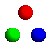Pixelated spheres in red, blue, and green arranged in a on a gray background with no visible motion