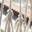 Pixelated image with vertical bars on left, yellow background on right, and brown text reading 'Summer '07'.