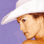 Pixelated static image of a person's profile wearing a white hat against a purple background with visible dithering and low-resolution rendering artifacts.