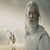 A man with long white hair and beard in a light robe stands against a hazy landscape, while a horseman on a white horse moves left to right across the background.