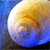 A pixelated circular shape with a gradient from white to yellow to orange, set against a blue background with dark and light blue tones.