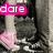 six grayscale showing a person's legs in dark pants and pink sneakers, with animated text overlays changing across frames