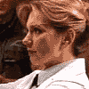 Animated sequence showing a woman with short blonde hair holding a handgun, transitioning from profile to front view while text below reads "JANET, DON'T DO IT".