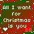 Pixelated text reads 'All I want for Christmas is you' on a gradient background with a heart symbol and 'EE' text, bordered by red and green.