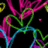 Pixelated abstract shapes in pink, green, and blue on black background with cyan text reading Live. Laugh. Love.