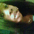 A person with long dark hair and light skin appears in three distinct poses across a , each showing slight variations in head angle and facial expression