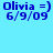 Blue pixelated text on light blue background reads "Olivia =) 6/9/09" in two identical side-by-side instances.