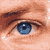 A 4x3 contact sheet of animated frames showing a pixelated close-up of a person's face with blue eyes, transitioning to full-face views and text elements against a light blue background.