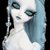 Pixelated static image of a figure with light skin, dark hair, and teal eyeshadow against a black background.
