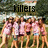 Group of five figures in pink dresses with white accents standing outdoors under a tree, text "killers" above.