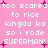 Pink background with white pixelated text repeating 'too scared to ride kingda ka so i rode SUPERMAN!' and small pink plus signs scattered throughout.