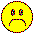 Six yellow circular pixel art faces with red and black borders, each displaying distinct sad expressions against a gray background.