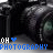 Pixelated image showing a dark, blurry figure holding a camera with visible lens flare against a black background and text reading 'OH ♡ PHOTOGRAPHY' in blue and white.