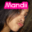 Pixelated image of a person with light brown hair and fair skin, overlaid by bright pink text reading 'Mandii' in white letters.