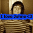 Pixelated image of a person with dark hair against brown background, overlaid blue banner with text 'I love Johnx3' in black font.