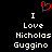 Red pixelated heart symbol above white text reading 'I Love Nicholas Guggino' on black background.