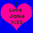 Two identical pink hearts on blue background with text "I Love Jamie !!<33" in green pixelated font.