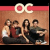 Static 50x50 pixel icon featuring a group of five people in front of an orange-brown background with "OC" text at the top, rendered in low-resolution pixel art style.