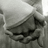Black-and-white image of two hands clasped together with red pixelated text overlay reading "I always want to hold u and never let u go".
