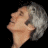 Pixelated profile of a person with gray hair against black background, adjacent to green text reading 'Original Icons .com' in bright green pixel font.