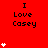 Red background with repeated 'I Love Casey' text and white heart symbols in varying quantities across a