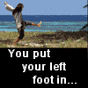 Animated sequence showing a person in white clothing performing a dance move on a beach, with text overlays repeating '...and shake it all about!' and 'You put your left foot in...'.