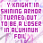 A static image of repeated text in pink and purple pixelated font on a white background with faint diagonal lines.