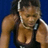 Pixelated static image of a person in athletic attire against blue background with visible body parts and clothing details.