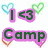 A static image of a digital icon featuring multiple heart outlines in various colors and two text elements: 'I <3' on a purple background and 'Camp' below it.
