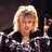 Pixelated image of a person with blonde hair in a dark setting, accompanied by pink text reading "I F'N LOVE YOU!!!!!" on a light background.