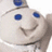 A pixelated image of a smiling dough-like character with blue eyes and a blue top, set against a solid blue background with white text reading "Do NOT Poke Me Or ELSE".