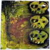 Three yellow skulls with black eye sockets and teeth are arranged vertically on a blurred background of green and brown hues.