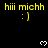 Yellow text 'hii michh :]' and white pixel hearts on black background with gray corner overlay, animated heart appearance.