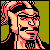 Pixelated 50x50 static buddy icon featuring a stylized character with pink hair, black facial features, and a green background.