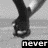 Black-and-white animation of a person's legs in motion with partial text overlays reading 'never', 'let', and 'go' on a light background.