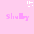 A static pixel art image with a light pink background, featuring a white pixelated heart above two instances of the name 'Shelby' in pink text.