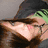 A split-screen image shows a person with glasses and brown hair on the top-left, a black background with green 'plus.' text on the top-right, a grayscale hand holding an object on the bottom-left, and red 'equal's love (:' text on the bottom-right.