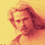 Pixelated static image of a person with long hair against a yellow background, rendered in warm red-orange tones.