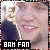 Pixelated image of a person with light skin and dark hair wearing a blue top, smiling broadly with visible teeth, overlaid by black banner reading "BAM FAN" in white block letters.